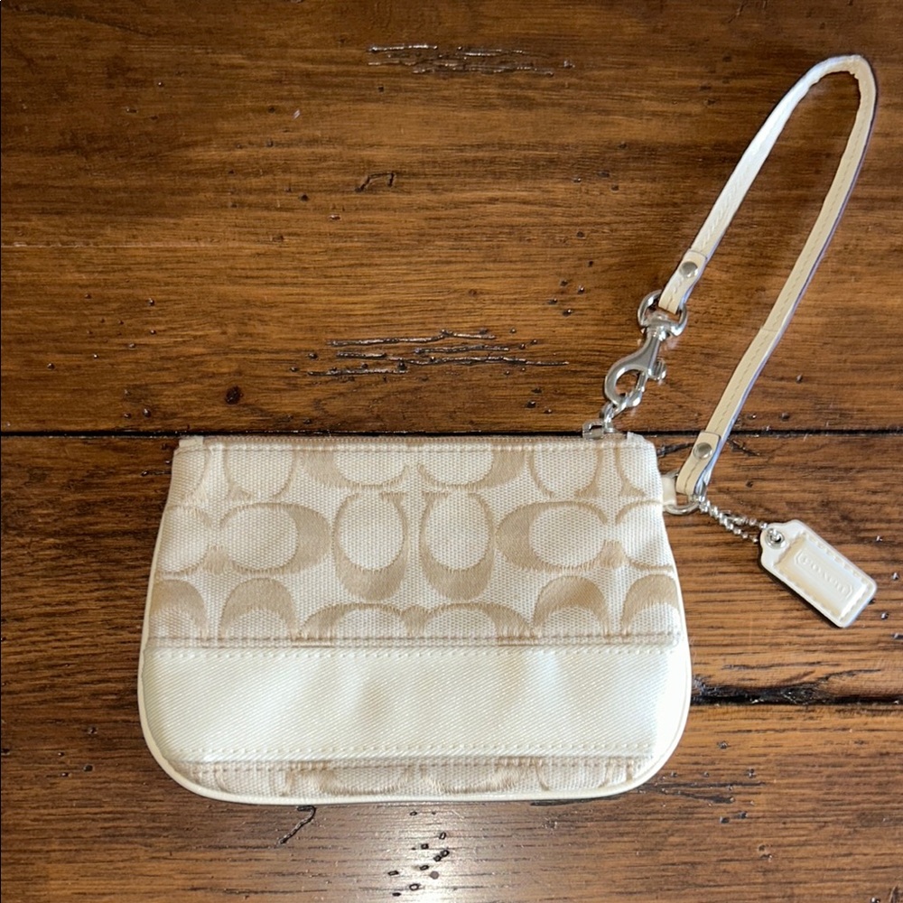 Coach Cream Clutch with Signature Pattern and Leather Trim